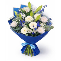 Royal blue bouquet with lilies, chrysanthemums, and delphinium