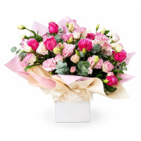 A bouquet of roses and lilies of the valley