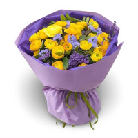 “Purple Sun” – yellow ranunculus bouquet