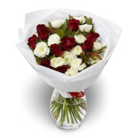Red and white roses and ranunculus bouquet